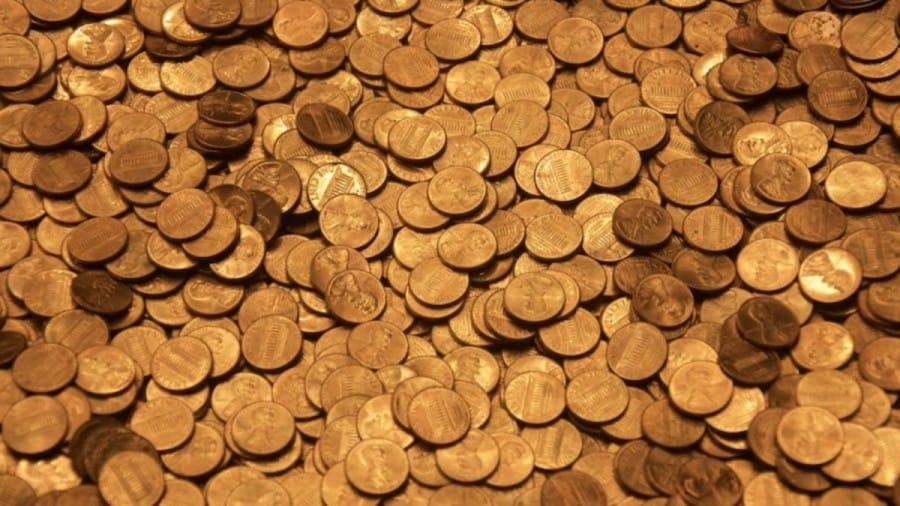 Optical Illusion Challenge: Spot the Cookie among the coins, if you have sharp eyes.
